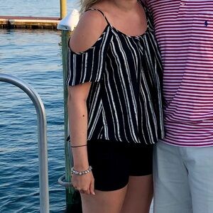 Lush black and white cold shoulder top